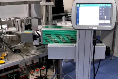 藥廠貼標機應用二氧化碳激光機打碼